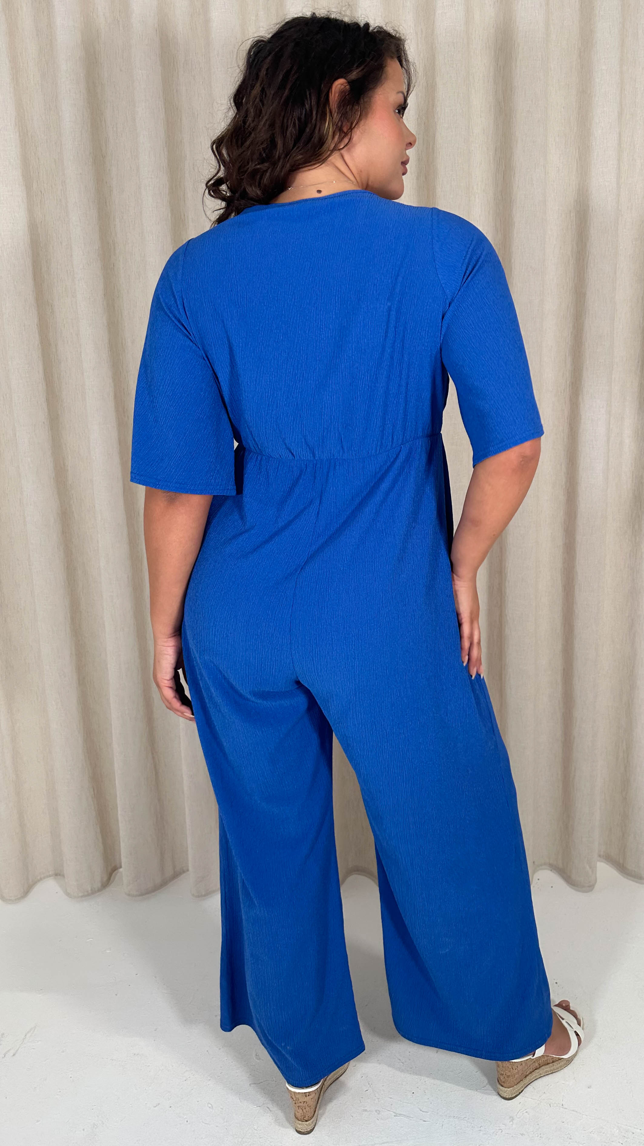 CurveWow Textured Angel Sleeve Wrap Wide Leg Jumpsuit Blue